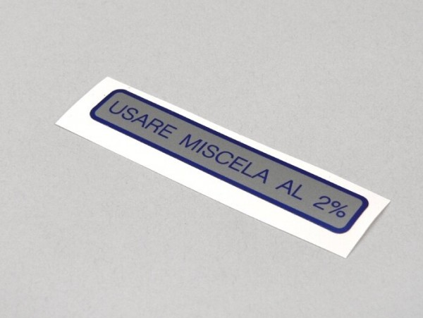 Sticker for fuel tank cap -OEM QUALITY- Vespa, Usare Miscela al 2% (1:50) (60x11mm) - blue